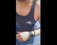 Guy wears tank top that says abibas