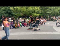 Collab WINY - Guys sit on chair mounted on skateboard