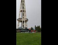 Woman in black outfit run around the park