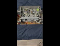 VCR without its case that operates a Tom and Jerry tape