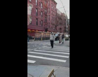 Guy does backflip and pirouette on crosswalk