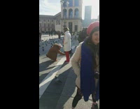 Guy red pants phone womans shoes