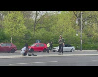 Guy army print jacket dance middle street