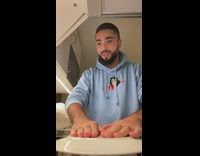 Man Nervously Flips Pot with Plate Cover