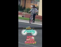 Guy waits to cross street bicycle 