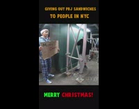 guys handing out food to homeless people