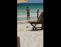 Girl pink bikini beach chair sandals umbrella