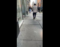 Guy walks around with ripped off pants 