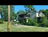 Car burned with Fire department building nearby