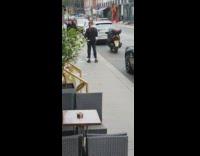 Group of people tiktok dance on the sidewalk