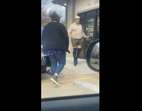 Guy walks in tall thigh high heels 