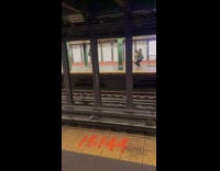 Woman leather jacket poses for subway video