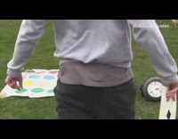 Guy plays Twister game by himself