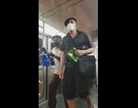 Subway performers sing face masks gift bags