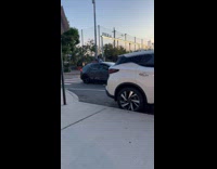 Two men on the car that moves