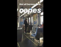 man lets pigeon out of subway car