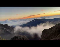 Time lapse of sunrise from volcano top 