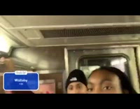 Girl records friends playing Heads up game on subway train