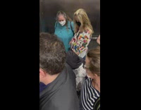 Guy on small scooter rides elevator out of subway and rides off