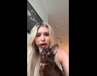 Woman shows pet cat imported from Russia