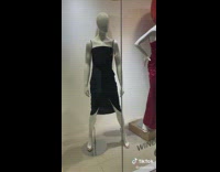 Guy labels poses of mannequins 
