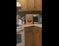 Girl stare at cereal box with face