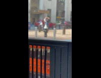 Woman in Black Walks Back and Forth for Photoshoot 