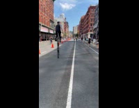 Man riding 3 layered tire unicycle