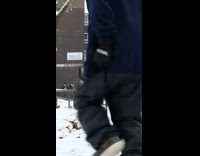 Guy rides snowboard on metal rail fail