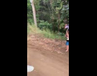 Guys form human tower to photograph girls