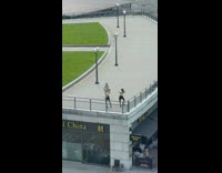 Two women tube top tiktok at the restaurant roof