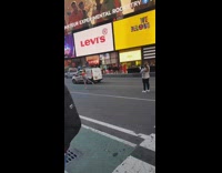 Girl stands in middle of road to pose 