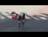 two girls cheerleaders hug floor pics