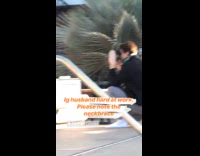 Neck brace guy photographs pink chair girl 