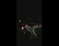 Black car speeds freeway behind cop fail 