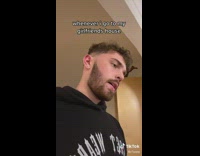 Girlfriends dog is excited to see guy does a spin 