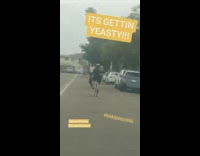 Collab Kook Of The Day - Two people ride bicycles road overcast yeasty  