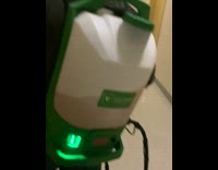 Exterminator walking out of room on bug covered floor