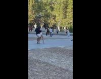 Man and woman intimate dance at the park
