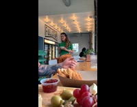 Girl poses with white coffee mug black headband 