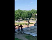 Woman yellow outfit walks slowly park pictorial