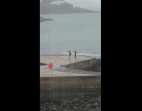 Girl red shirt dance pier orange lifebuoy