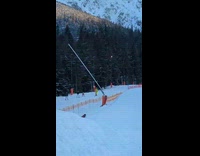 Guy snowboarding falls down after flip attempt