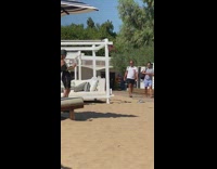 Woman backless sleeves tiptoe raise arms greece