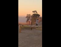 White hat girl mountain sunset light reflector 