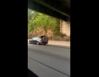 Car drive huge object on open trunk