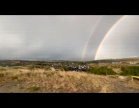 Double rainbow on hills looked like portal