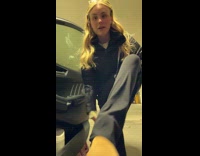 Woman does fit check on parking garage 