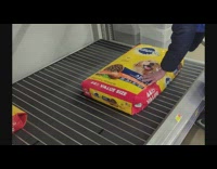 Kid move dog food bag on shelf rollers