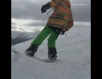 green pants snow board back flip